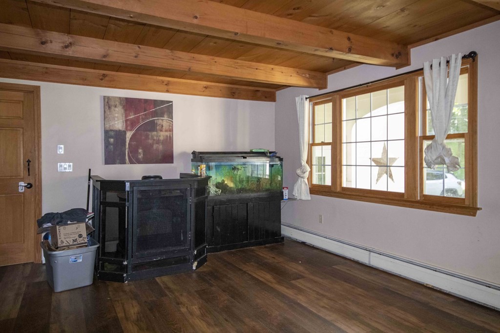 9 Elwood Road Derry, NH 03038 - Photo 12 of 42 a room with furniture and window