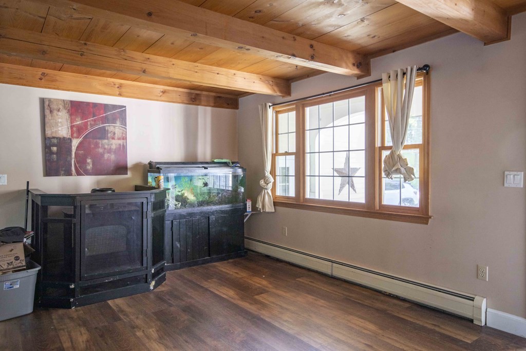 9 Elwood Road Derry, NH 03038 - Photo 13 of 42 a room with furniture and window