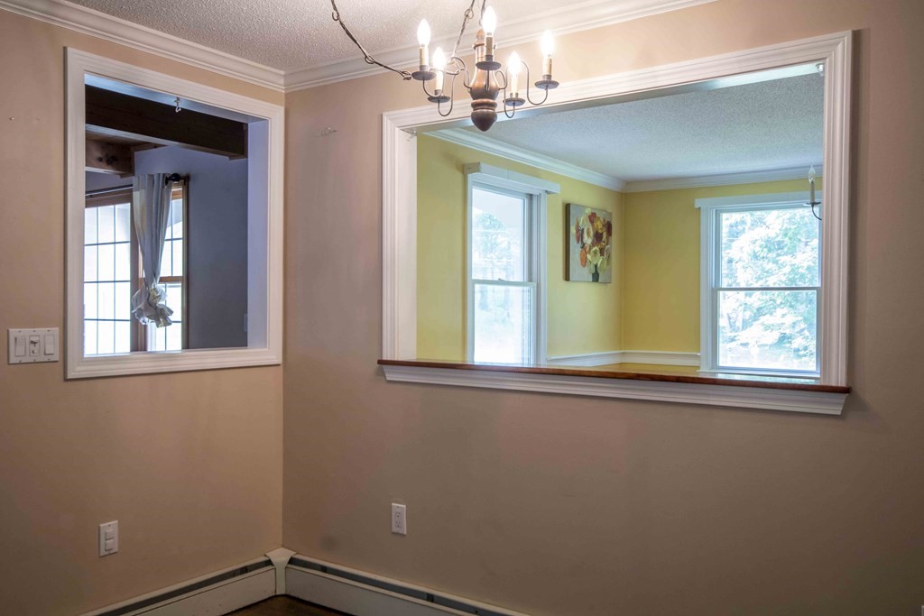 9 Elwood Road Derry, NH 03038 - Photo 19 of 42 a view of a room that has a window in it