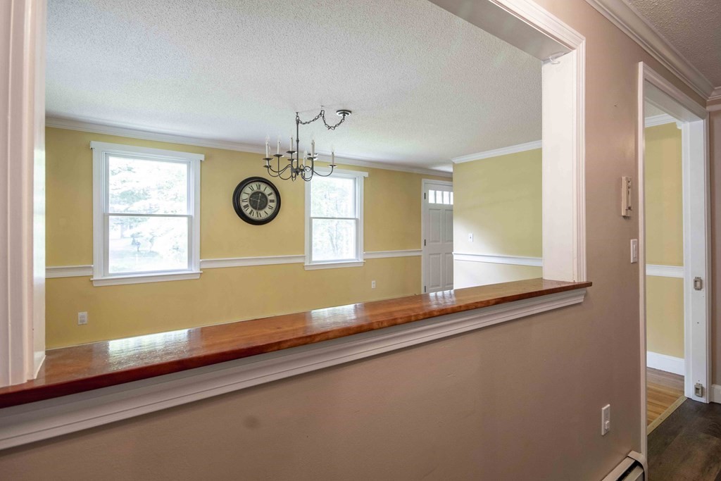 9 Elwood Road Derry, NH 03038 - Photo 24 of 42 a view of a window and chandelier