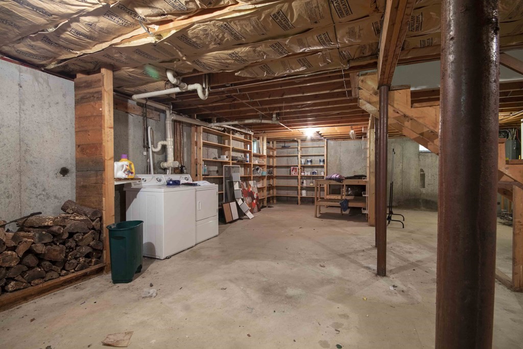 9 Elwood Road Derry, NH 03038 - Photo 39 of 42 a view of a storage room