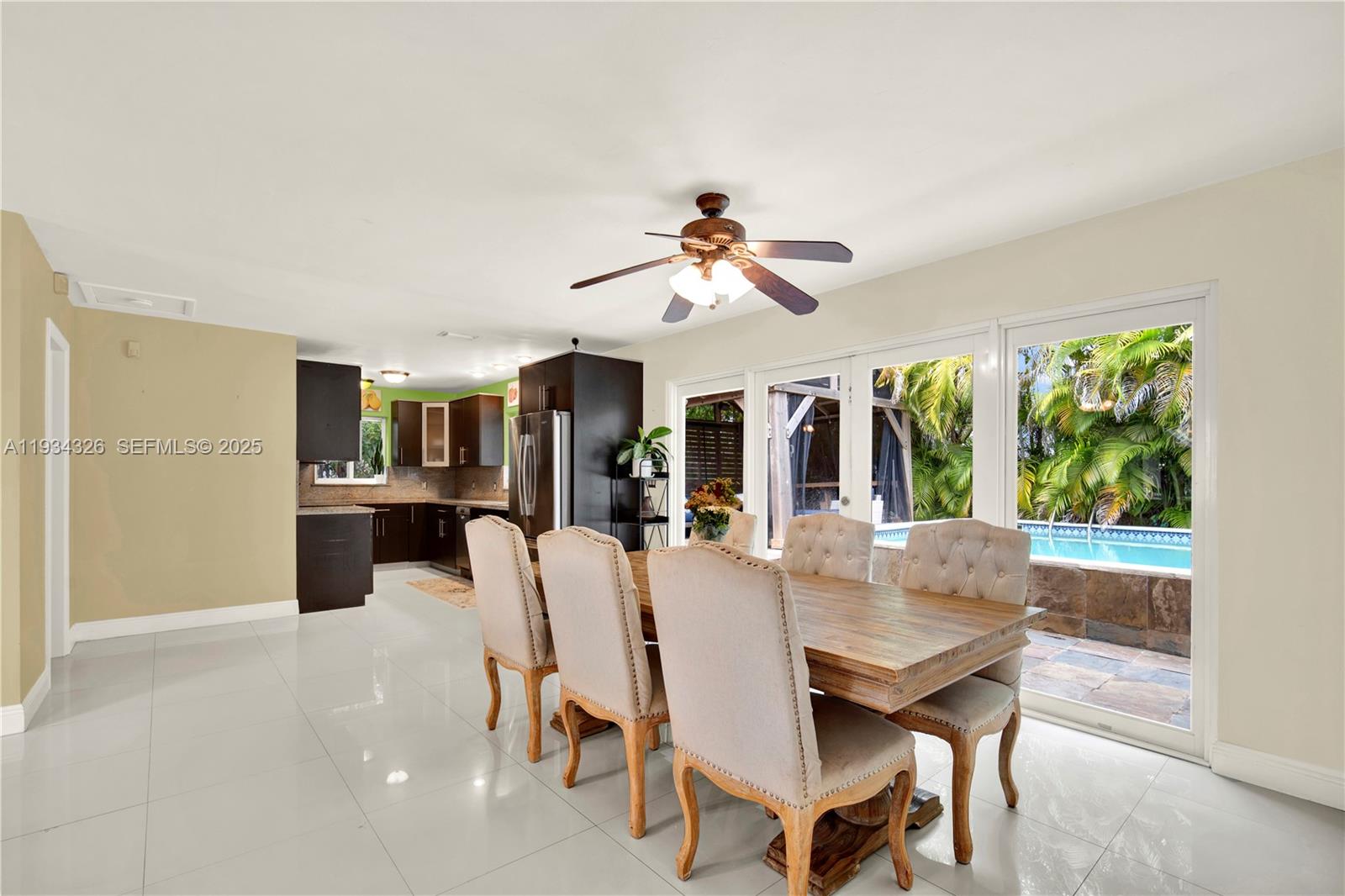7135 Southwest 19th Terrace Miami, FL 33155 - Photo 13 of 52 a view of a dining room with furniture window and outside view