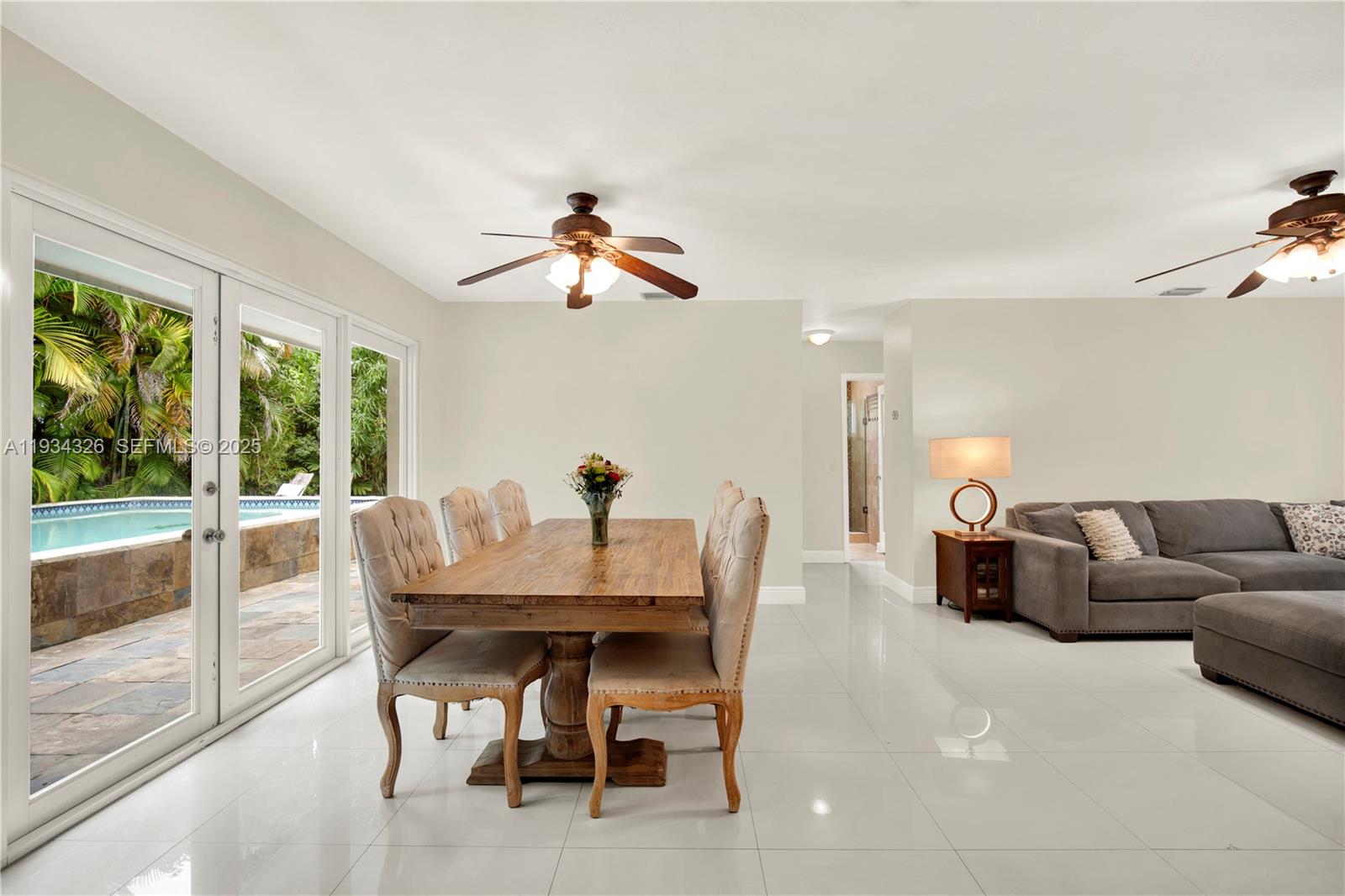 7135 Southwest 19th Terrace Miami, FL 33155 - Photo 15 of 52 a view of a dining room with furniture window and outside view