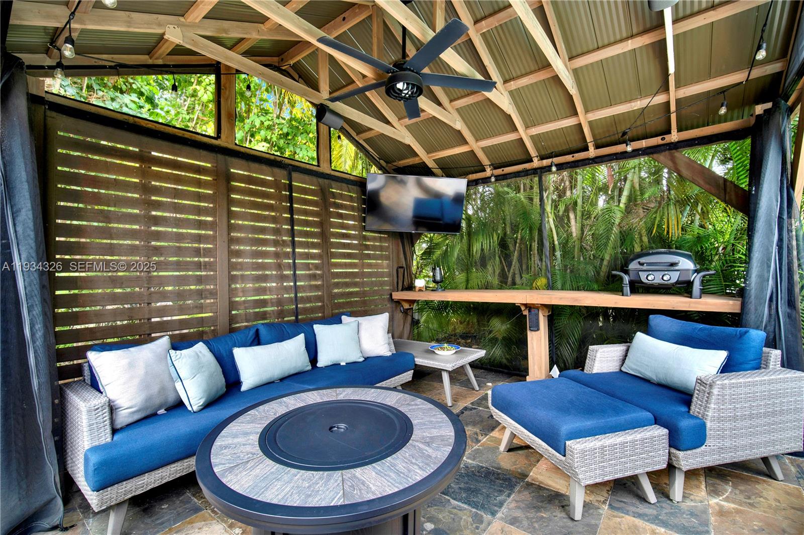 7135 Southwest 19th Terrace Miami, FL 33155 - Photo 34 of 52 a view of a chairs and table in a patio