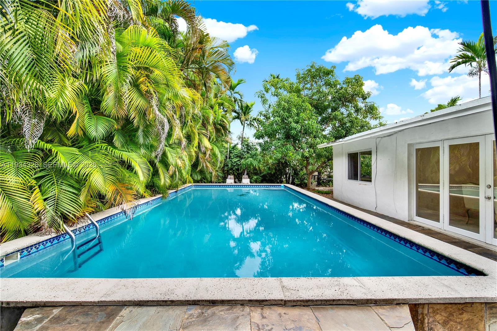7135 Southwest 19th Terrace Miami, FL 33155 - Photo 37 of 52 a view of a back yard of the house