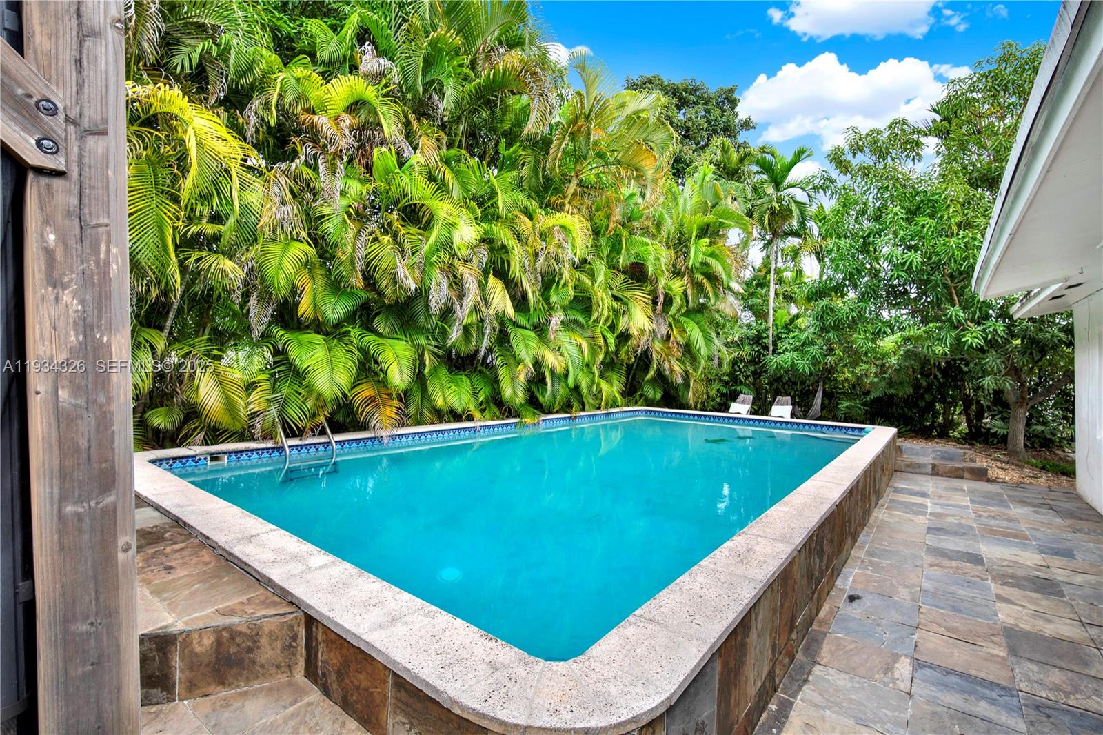 7135 Southwest 19th Terrace Miami, FL 33155 - Photo 40 of 52 a view of a bathtub in a backyard