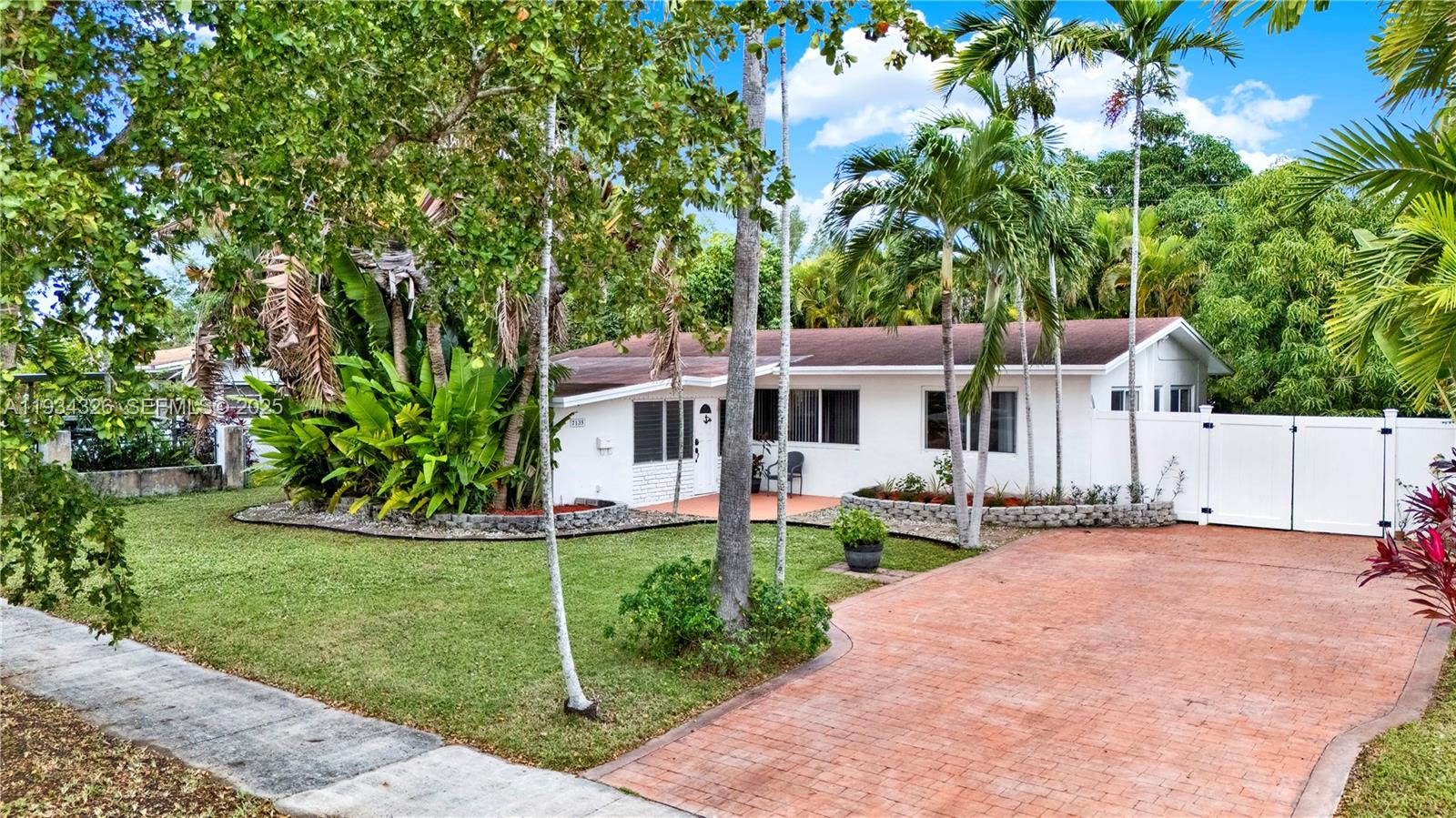7135 Southwest 19th Terrace Miami, FL 33155 - Photo 4 of 52 a view of a house with a yard and sitting area
