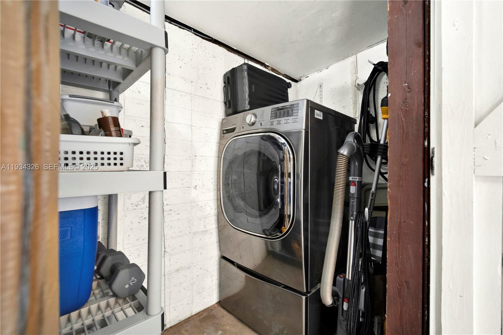7135 Southwest 19th Terrace Miami, FL 33155 - Photo 42 of 52 a utility room with dryer and washer
