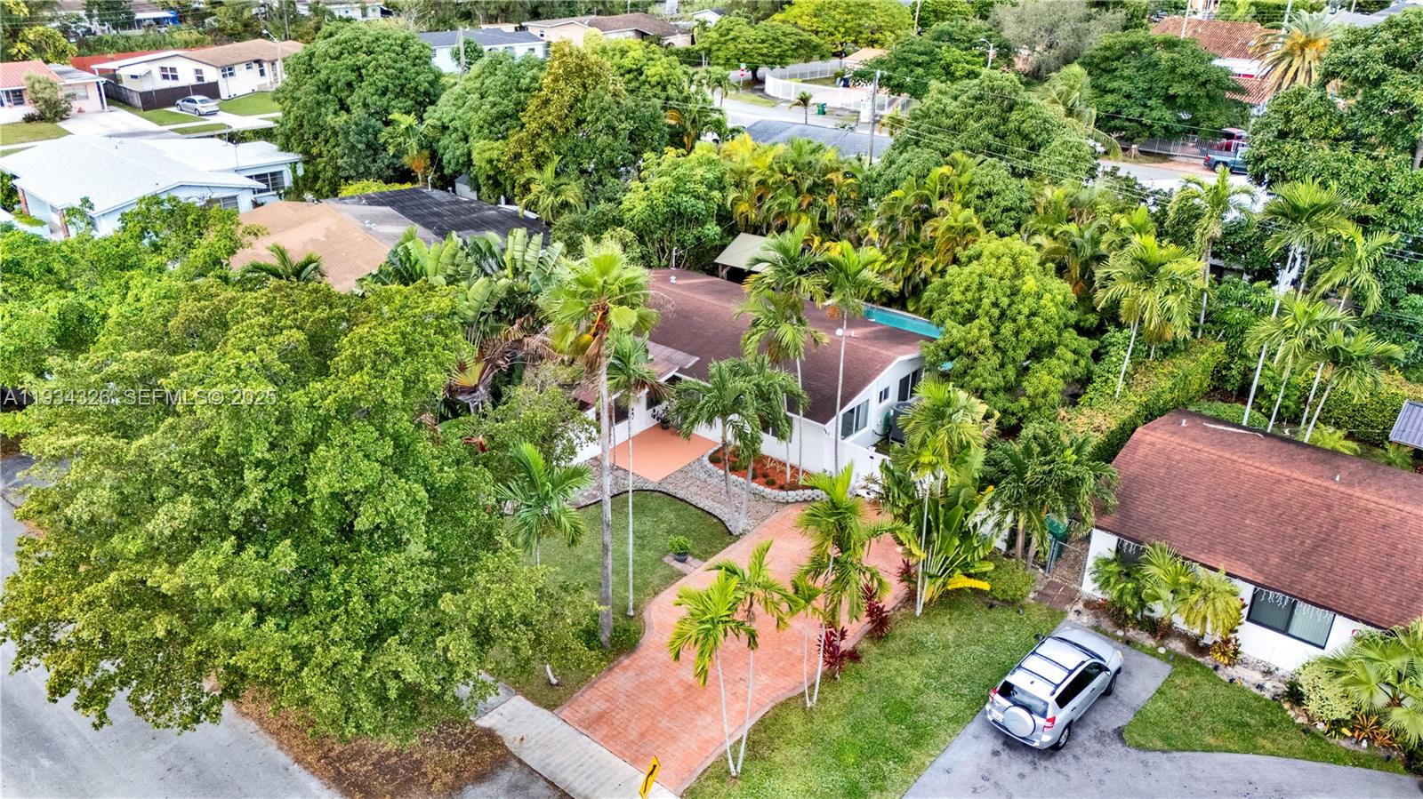 7135 Southwest 19th Terrace Miami, FL 33155 - Photo 46 of 52 an aerial view of a house with a yard