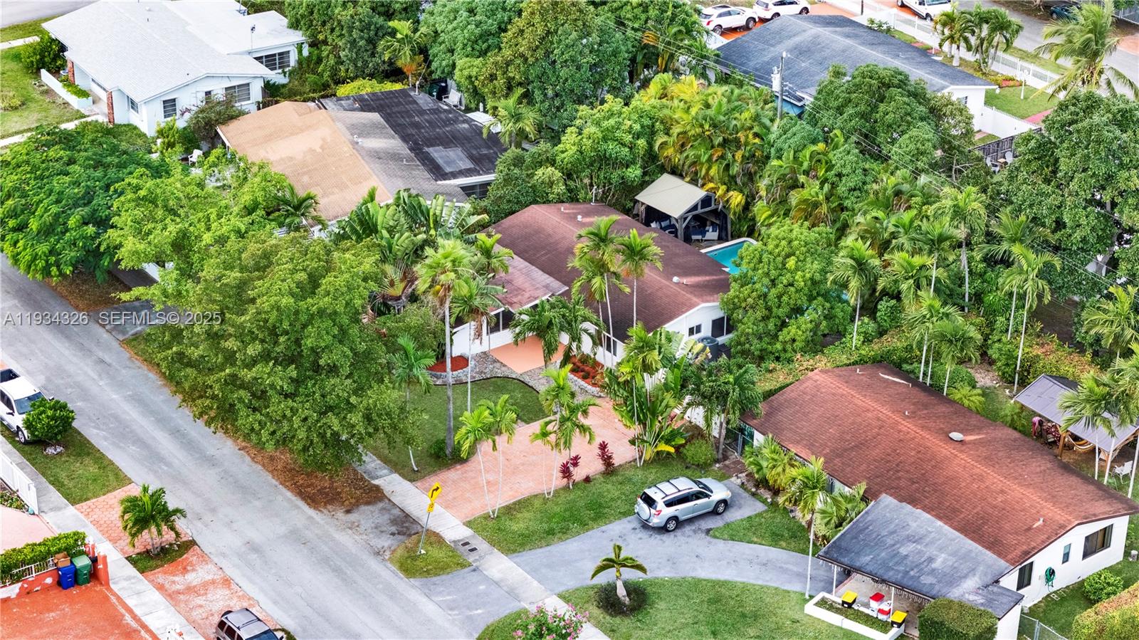 7135 Southwest 19th Terrace Miami, FL 33155 - Photo 50 of 52 an aerial view of a house with a yard and outdoor seating