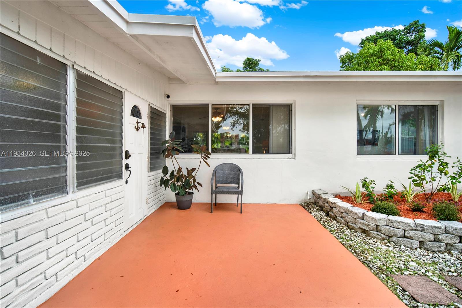 7135 Southwest 19th Terrace Miami, FL 33155 - Photo 5 of 52 a house view with a seating space