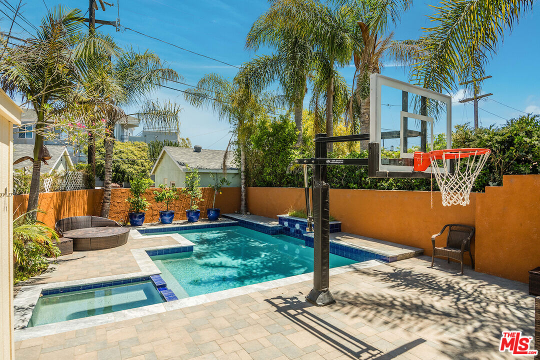 224 Sunridge Street Playa del Rey, CA 90293 - Photo 34 of 44 a front view of a house with garden