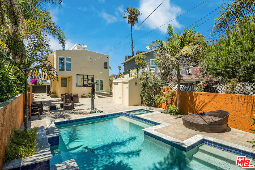 224 Sunridge Street Playa del Rey, CA 90293 - Photo 36 of 44 a view of a patio with chairs and potted plants