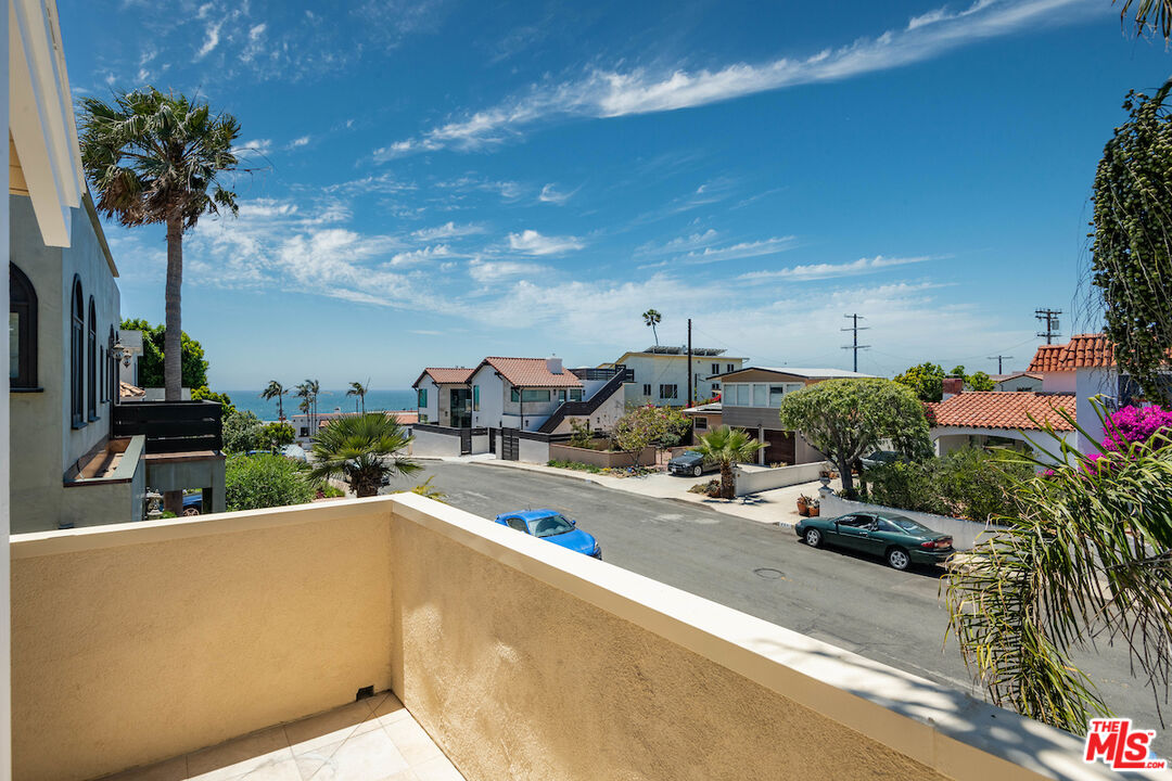 224 Sunridge Street Playa del Rey, CA 90293 - Photo 5 of 44 a view of a swimming pool and trees in the background