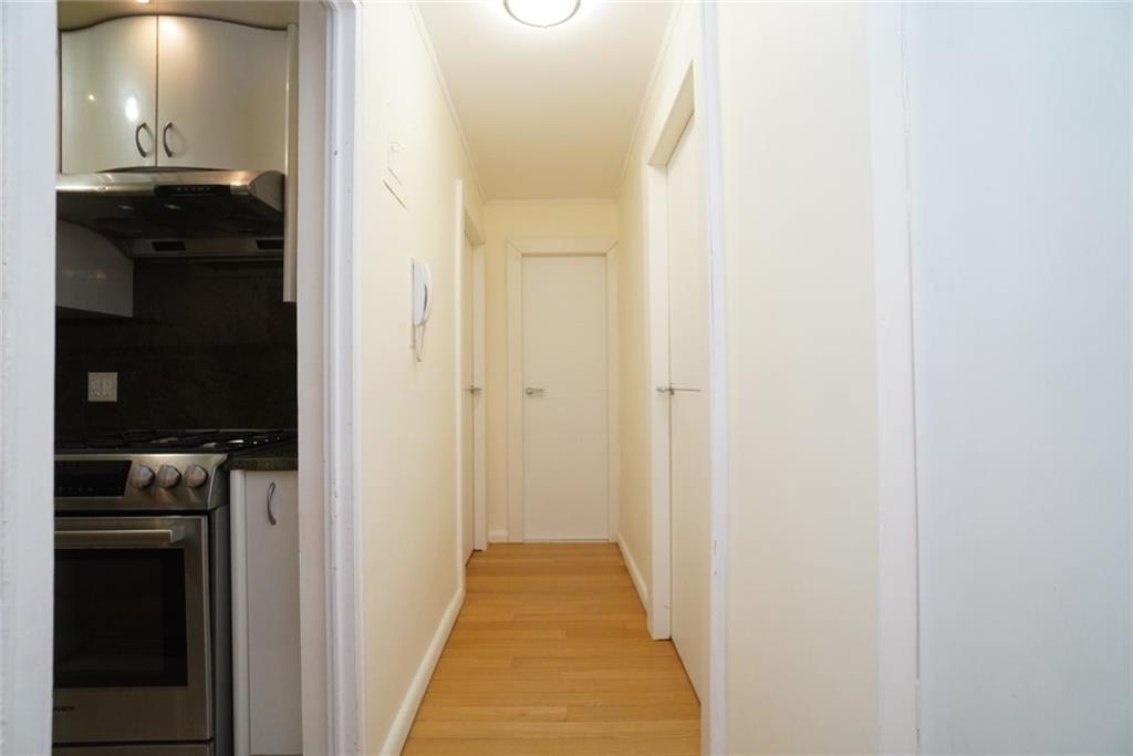 35 Seacoast Terrace, Unit 2N Brooklyn, NY 11235 - Photo 25 of 38 a view of a bathroom from the hallway