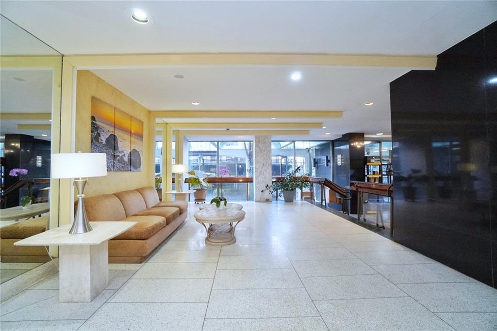 35 Seacoast Terrace, Unit 2N Brooklyn, NY 11235 - Photo 35 of 38 a living room with furniture and a large window