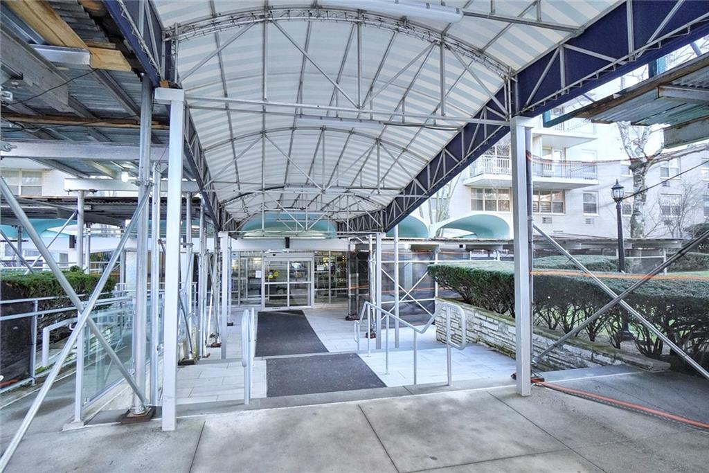 35 Seacoast Terrace, Unit 2N Brooklyn, NY 11235 - Photo 36 of 38 a view of a patio with table and chairs