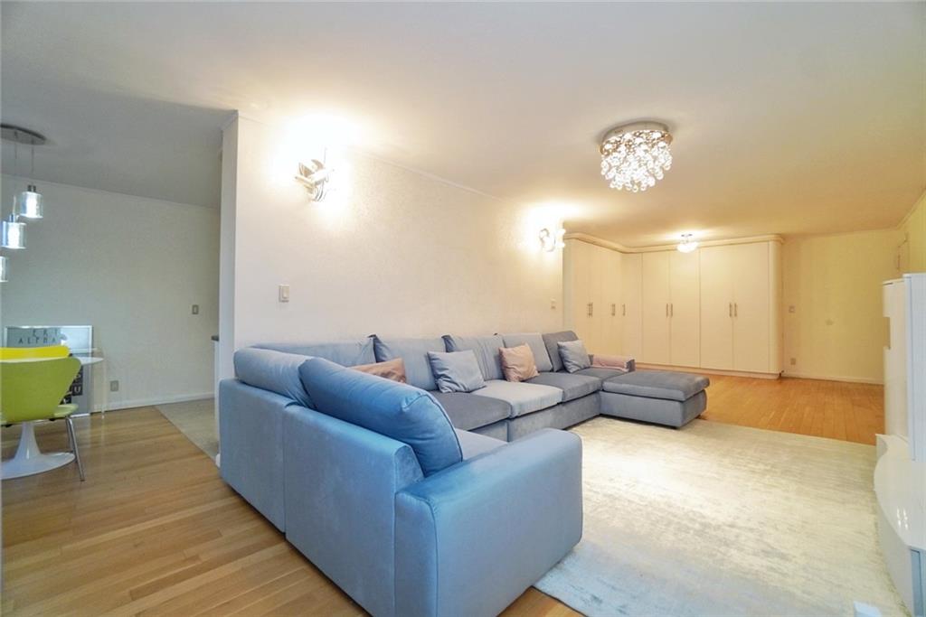 35 Seacoast Terrace, Unit 2N Brooklyn, NY 11235 - Photo 6 of 38 a living room with furniture