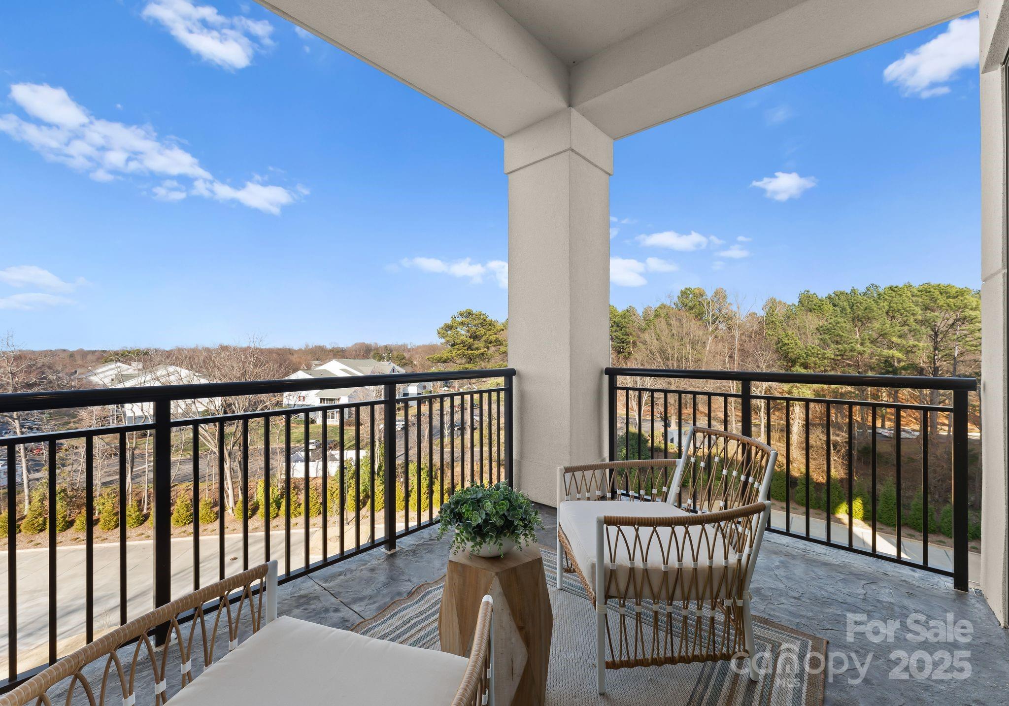 19329 Watermark Drive, Unit 551 Cornelius, NC 28031 - Photo 12 of 25 a view of a balcony with furniture