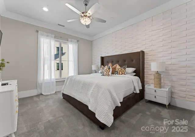 a bathroom with a granite countertop sink a toilet a mirror and shower