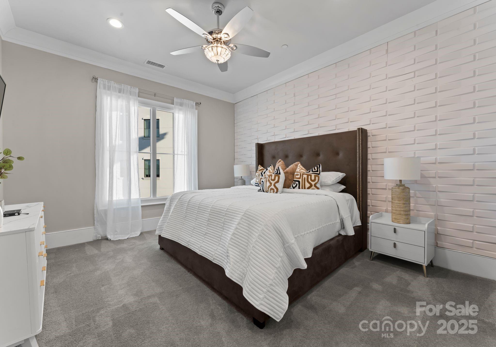 19329 Watermark Drive, Unit 551 Cornelius, NC 28031 - Photo 17 of 25 a bed room with a bed and a window