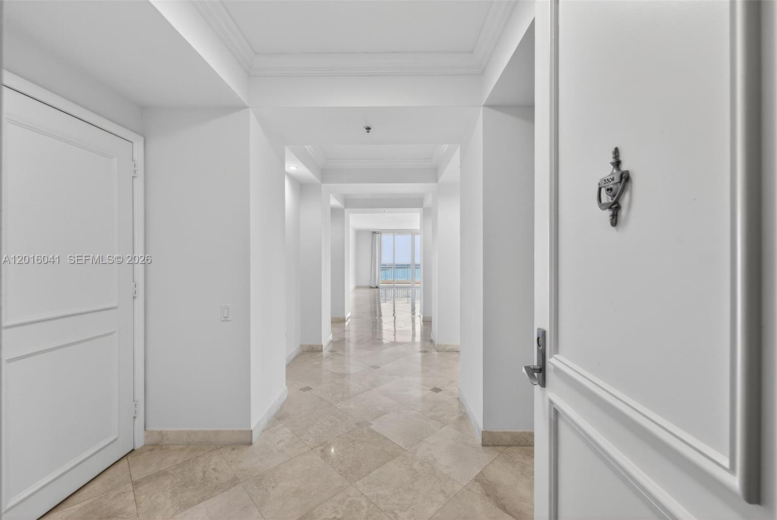 808 Brickell Key Drive, Unit 3304 Miami, FL 33131 - Photo 12 of 70 a view of a hallway with closet area