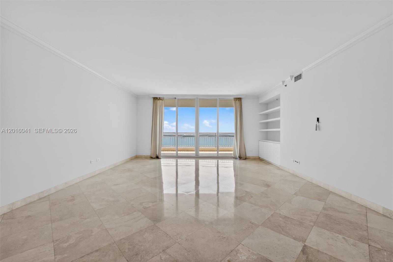808 Brickell Key Drive, Unit 3304 Miami, FL 33131 - Photo 20 of 70 a view of an empty room with a window
