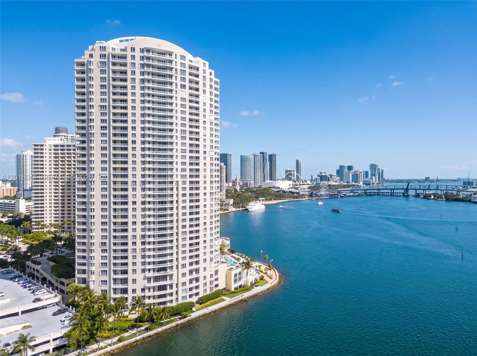 808 Brickell Key Drive, Unit 3304 Miami, FL 33131 - Photo 2 of 70 a view of swimming pool with outdoor space and tall buildings
