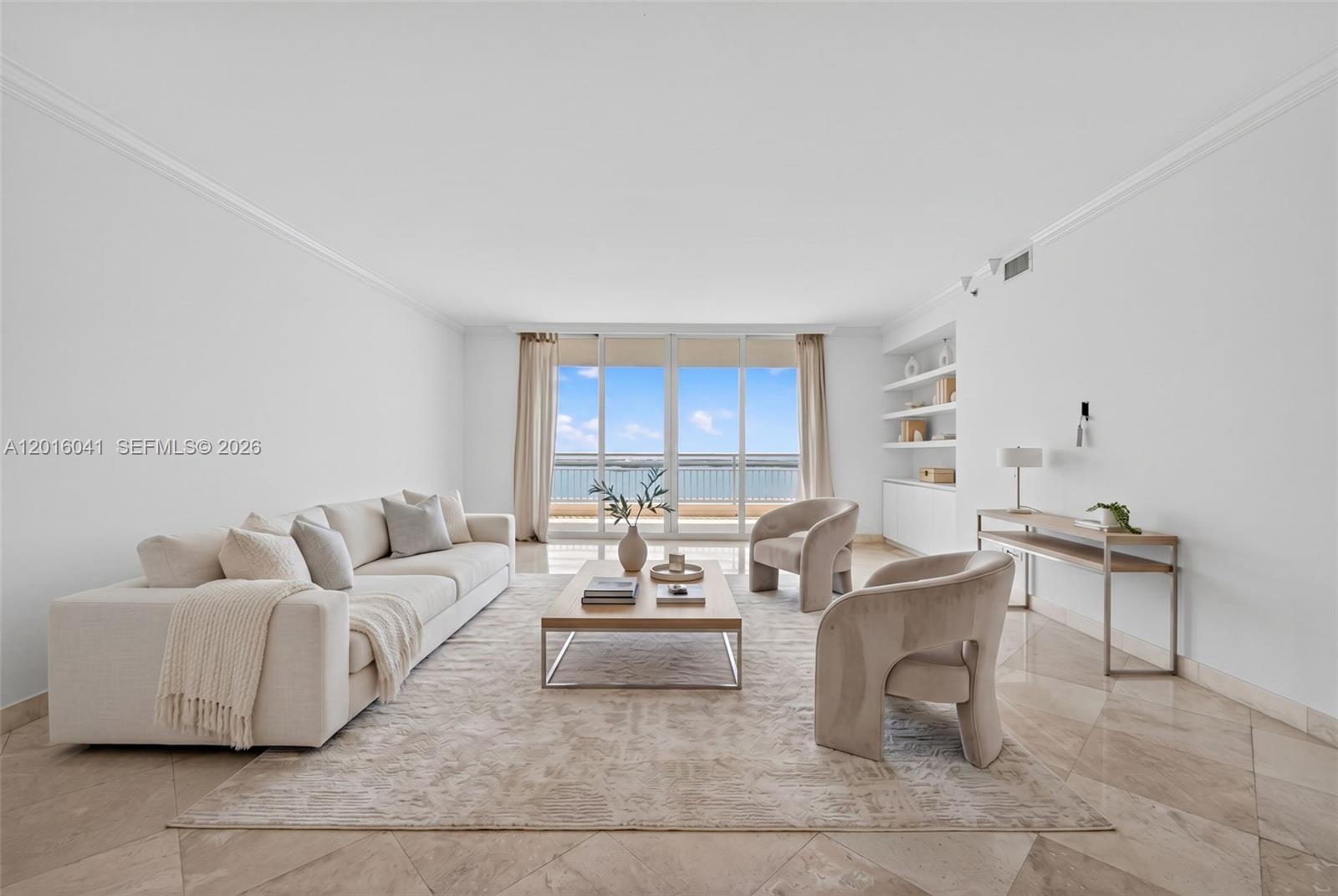 808 Brickell Key Drive, Unit 3304 Miami, FL 33131 - Photo 21 of 70 a living room with furniture and a window