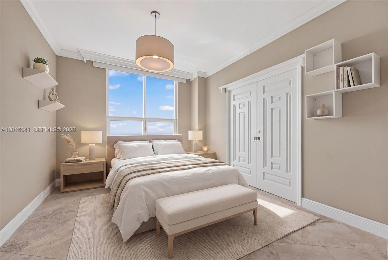 808 Brickell Key Drive, Unit 3304 Miami, FL 33131 - Photo 27 of 70 a bedroom with a bed chandelier and a window