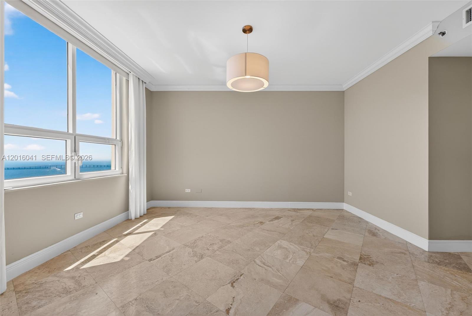 808 Brickell Key Drive, Unit 3304 Miami, FL 33131 - Photo 30 of 70 a view of an empty room with a window