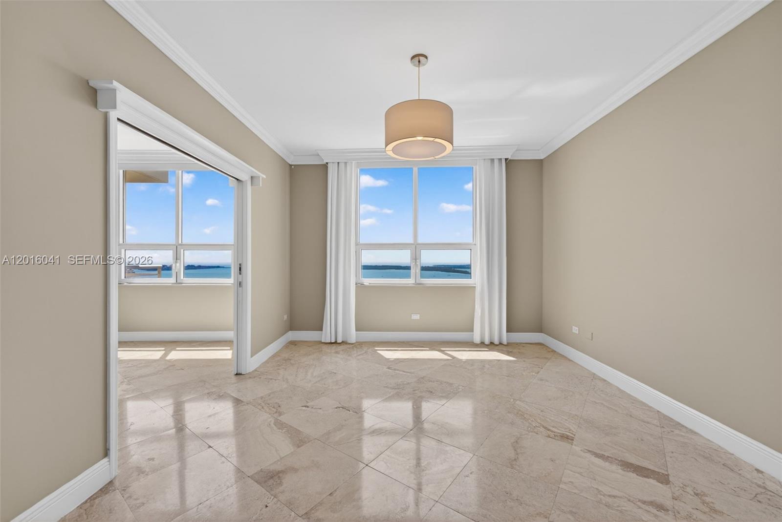 808 Brickell Key Drive, Unit 3304 Miami, FL 33131 - Photo 31 of 70 a view of an empty room with a kitchen