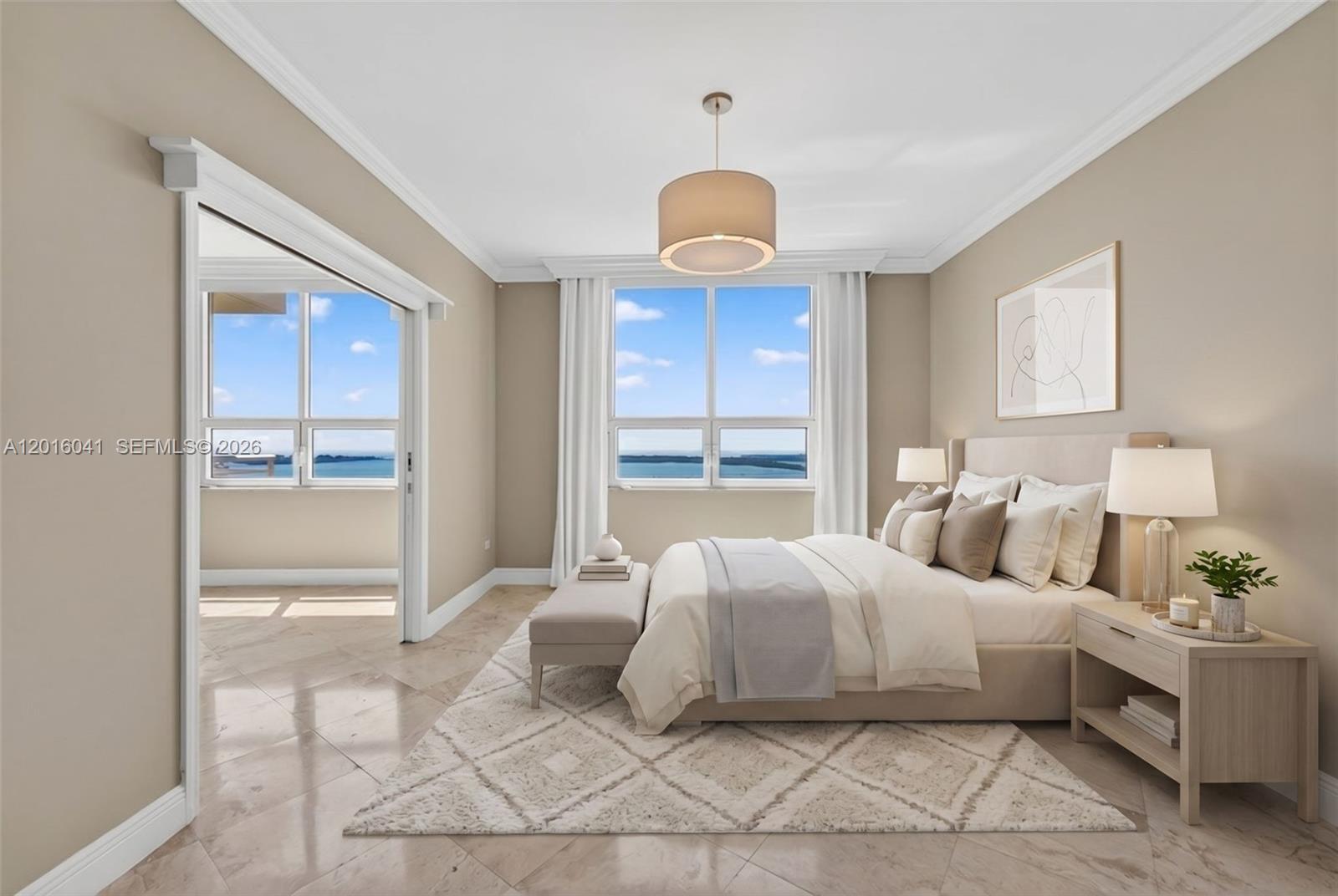 808 Brickell Key Drive, Unit 3304 Miami, FL 33131 - Photo 32 of 70 a bedroom with a bed and a window