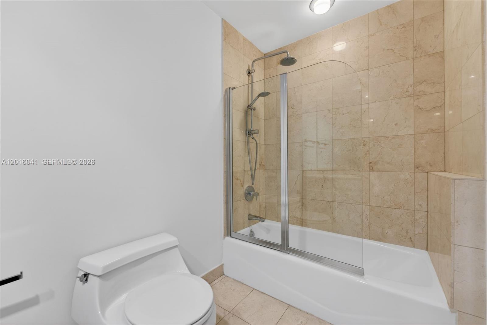 808 Brickell Key Drive, Unit 3304 Miami, FL 33131 - Photo 34 of 70 a bathroom with a toilet and a shower