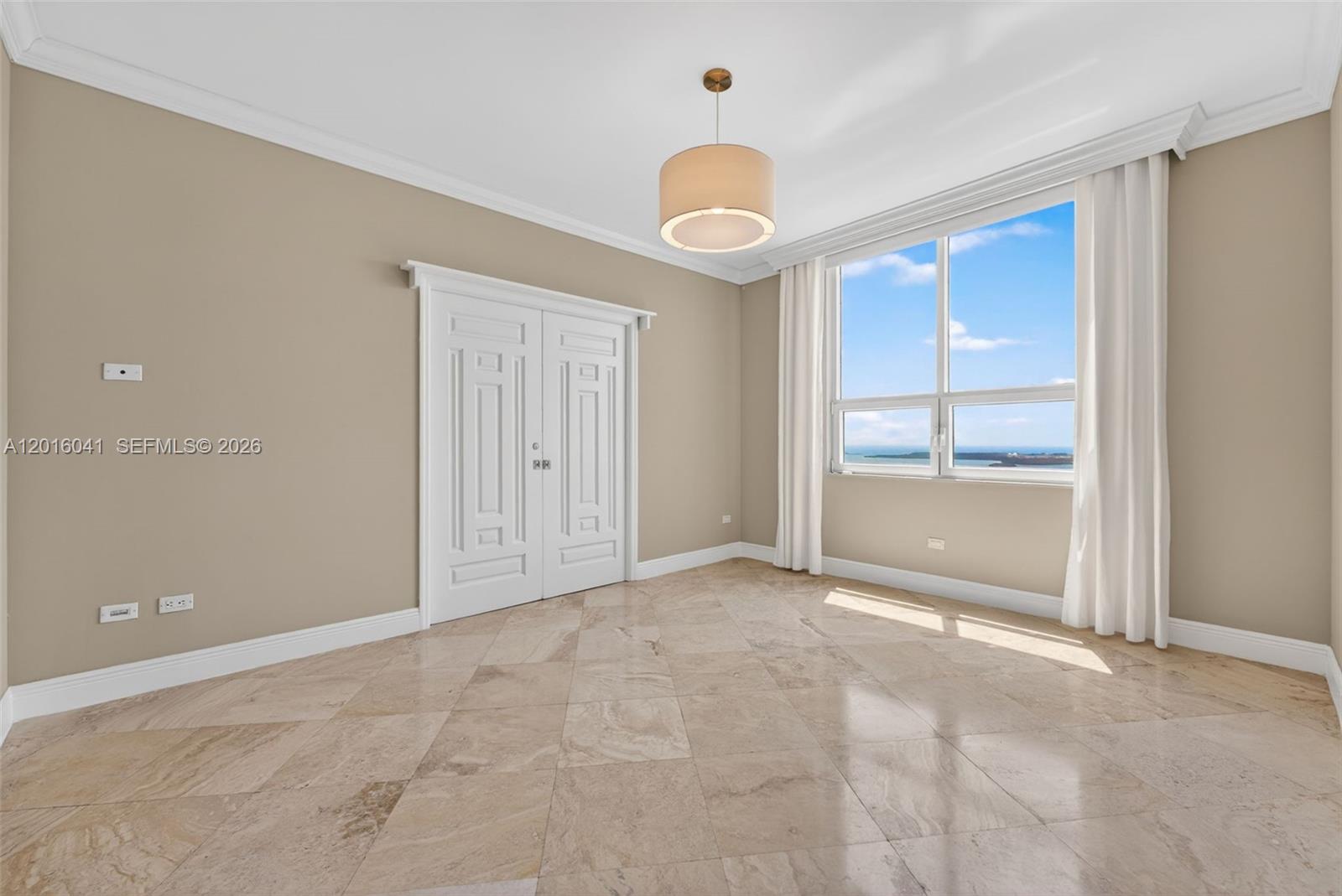 808 Brickell Key Drive, Unit 3304 Miami, FL 33131 - Photo 37 of 70 a view of an empty room with a window