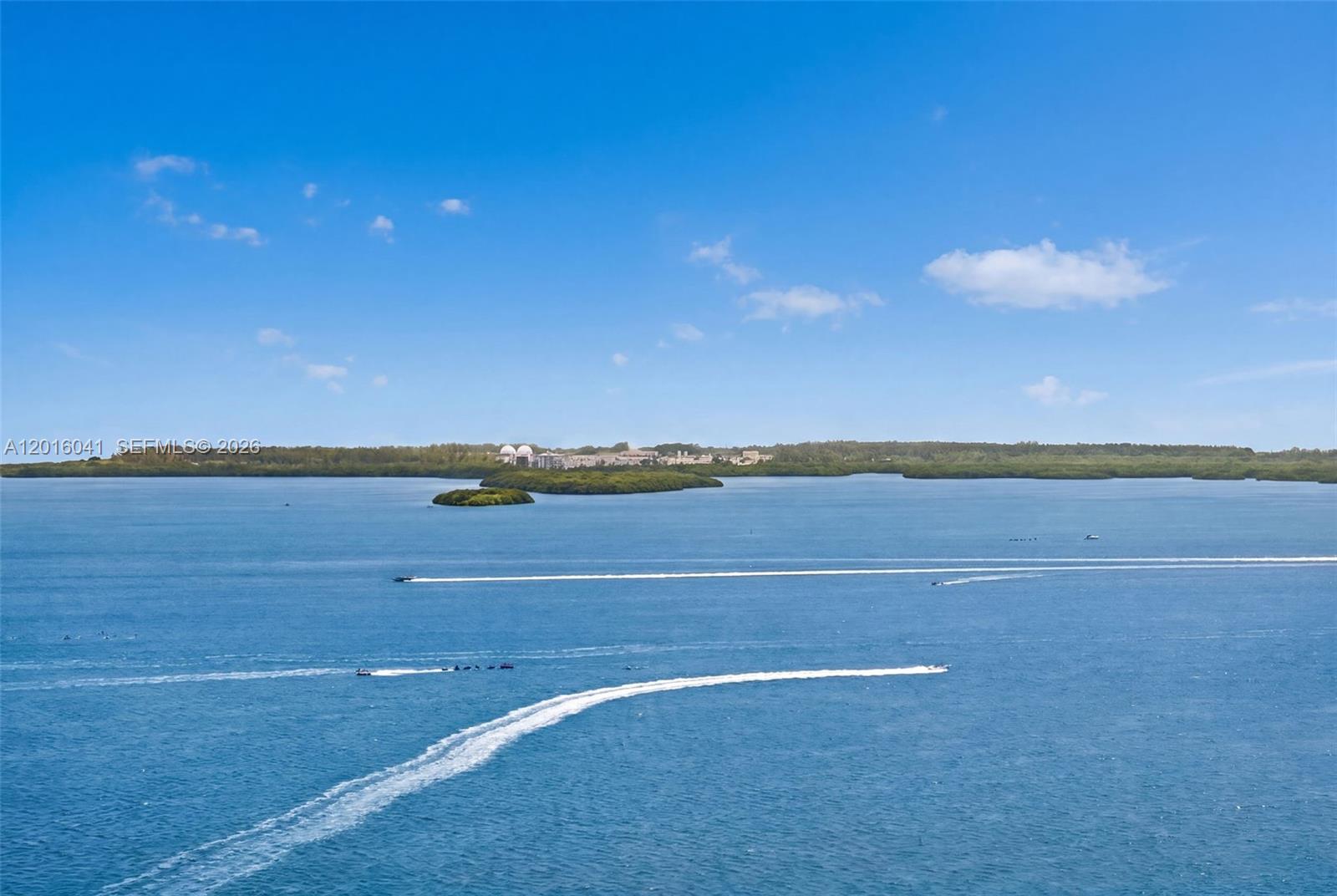 808 Brickell Key Drive, Unit 3304 Miami, FL 33131 - Photo 50 of 70 a view of an ocean and beach