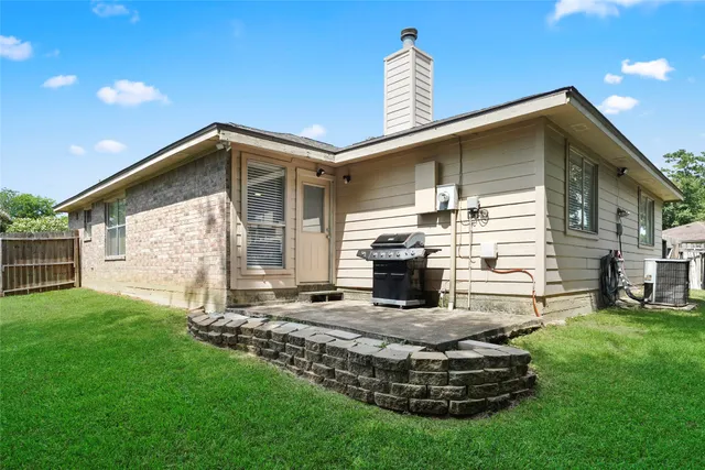 a house view with a garden space