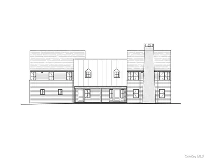 a view of a house with a small yard