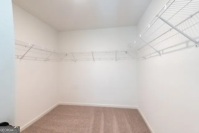 a view of a room with racks on the wall