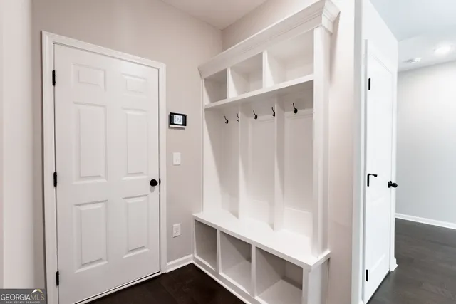 a view of an entryway with hallway