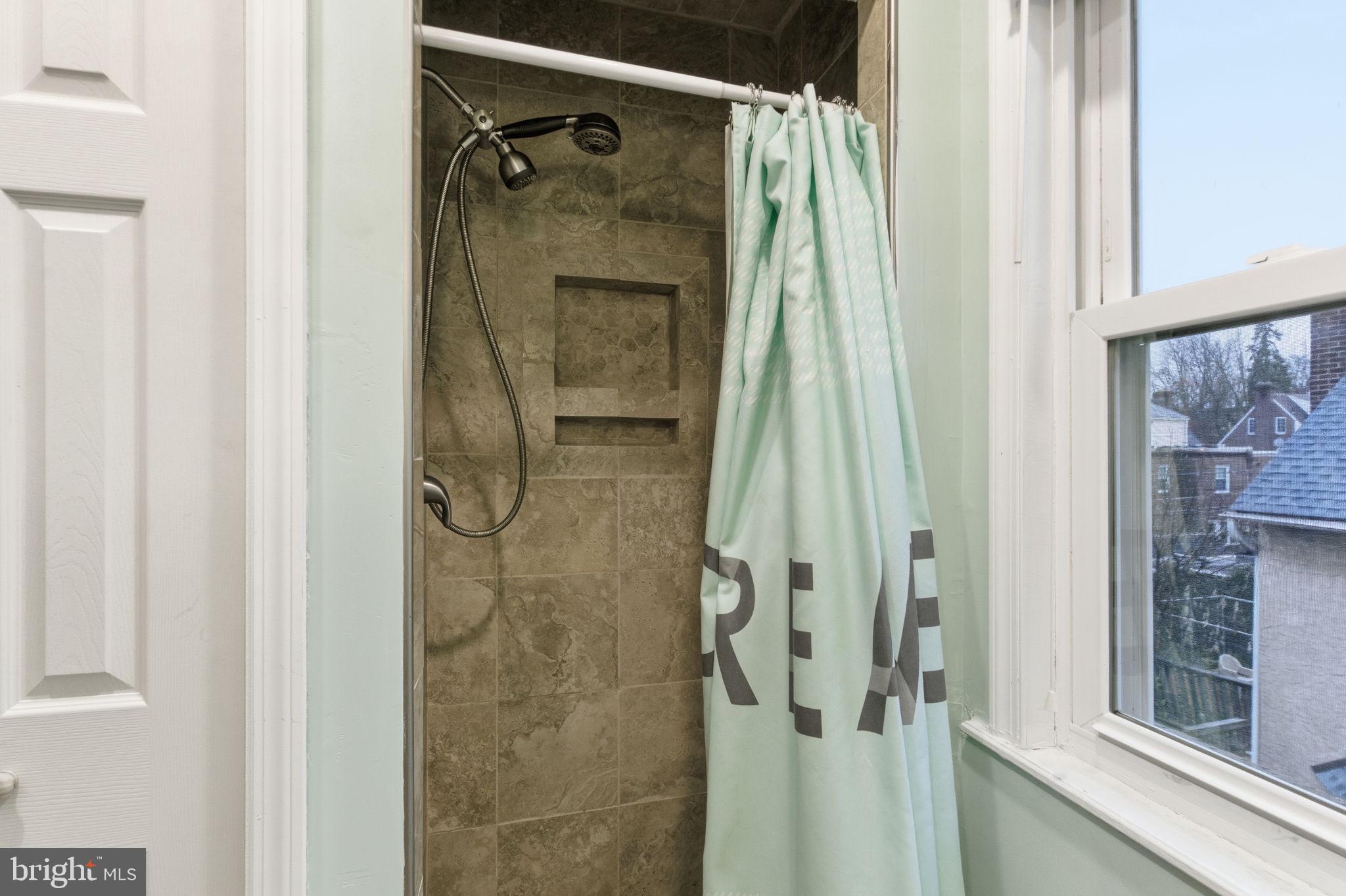 212 Upland Road Merion Station, PA 19066 - Photo 22 of 32 a bathroom with a shower