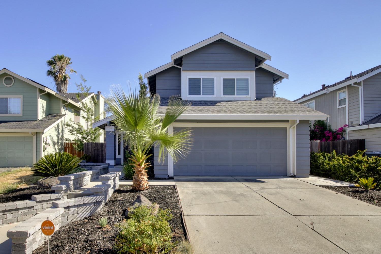 3754 Willow Bend Place Antelope, CA 95843 - Photo 1 of 1 a front view of a house with a yard