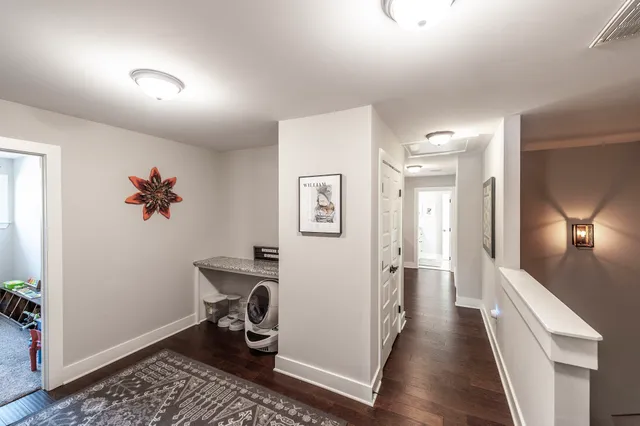 a room with furniture and a ceiling fan