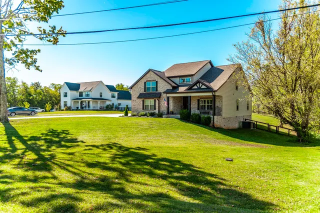 a front view of a house with swimming pool