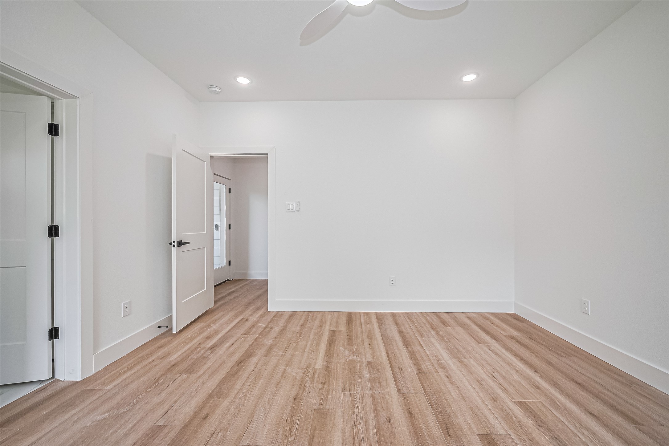 6023 Maybell Street Houston, TX 77091 - Photo 3 of 37 a view of a room with wooden floor