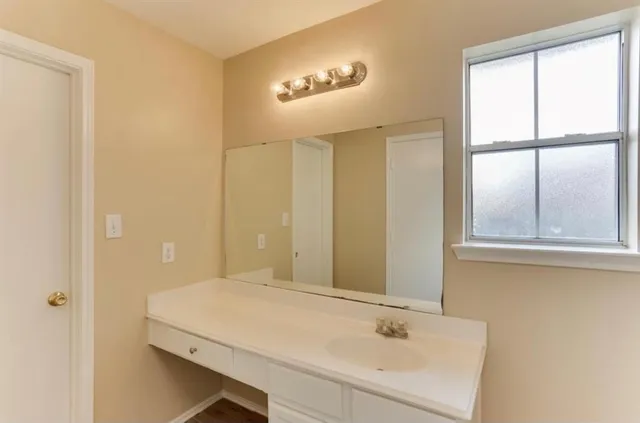 a white bath tub sitting in a bathroom