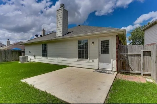 a front view of house with yard and outdoor seating