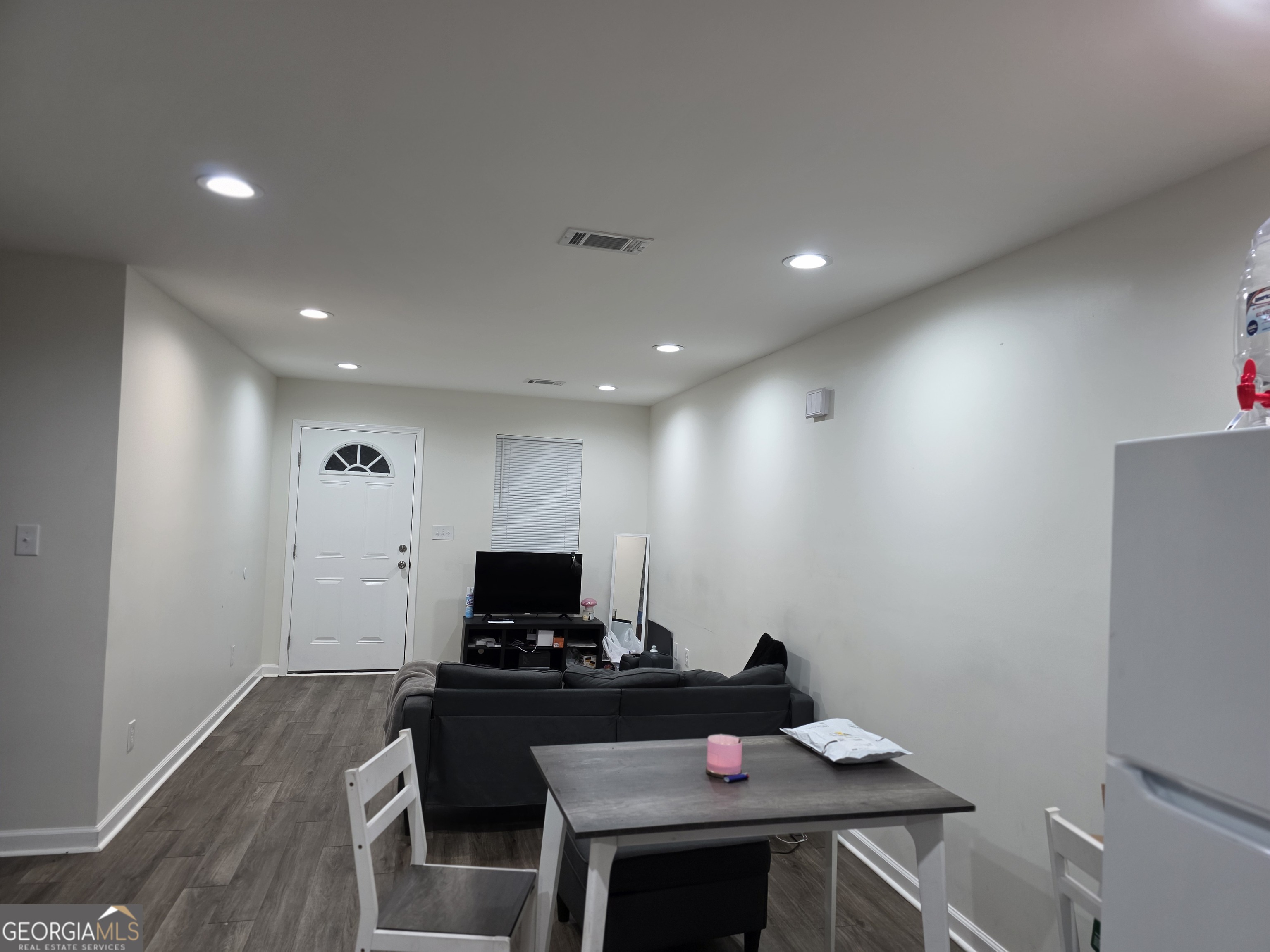 317 Preston Street Fort Valley, GA 31030 - Photo 5 of 7 a view of a workspace with furniture