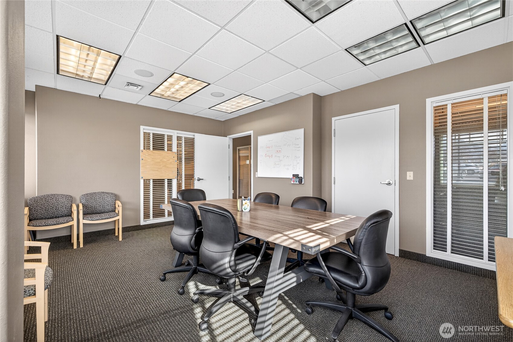 1 Fifth Street, Unit 110 Wenatchee, WA 98801 - Photo 12 of 13 a view of a dining room with furniture window and outside view