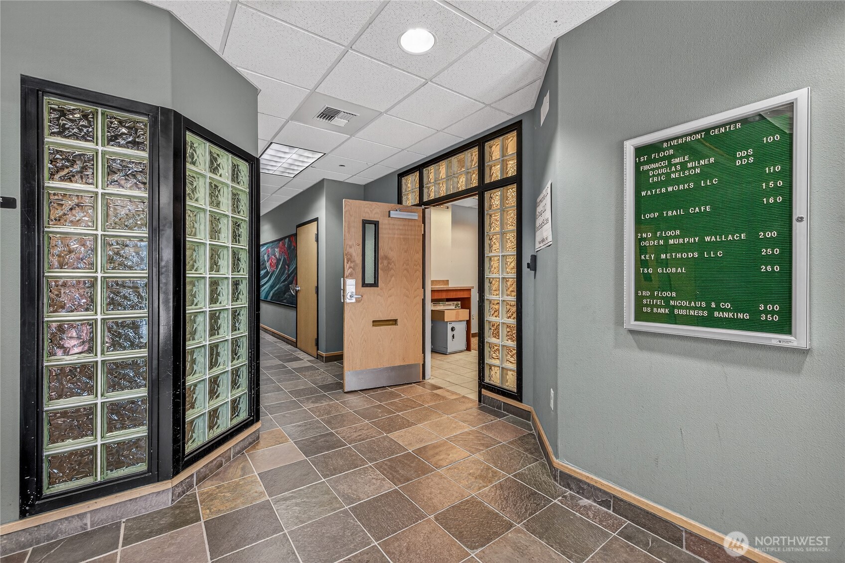 1 Fifth Street, Unit 110 Wenatchee, WA 98801 - Photo 5 of 13 a view of empty room with windows